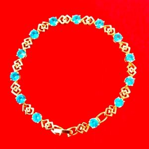 Blue Topaz 18k Yellow GF Bracelet.